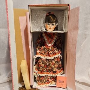 VTG - Elegant Floral Porcelain Doll with Red Accents